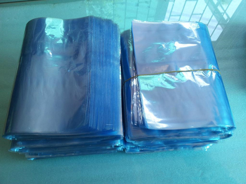 东莞恩诚PVC收缩膜 全新料PVC透明蓝色/白色卷料 平口袋弧形袋示例图3